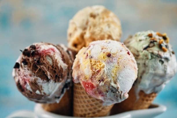 Four Vouchers: Each Good for a One-Scoop Ice Cream Sundae with One Topping; Valid for Takeout