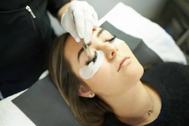 One Individual Volume Eyelash Set + Two Week Fill