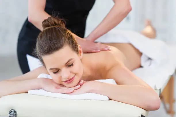 50-Minute Swedish Massage and 80-Minute Rose Petal Facial with Choice of Microdermabrasion or Face Massage